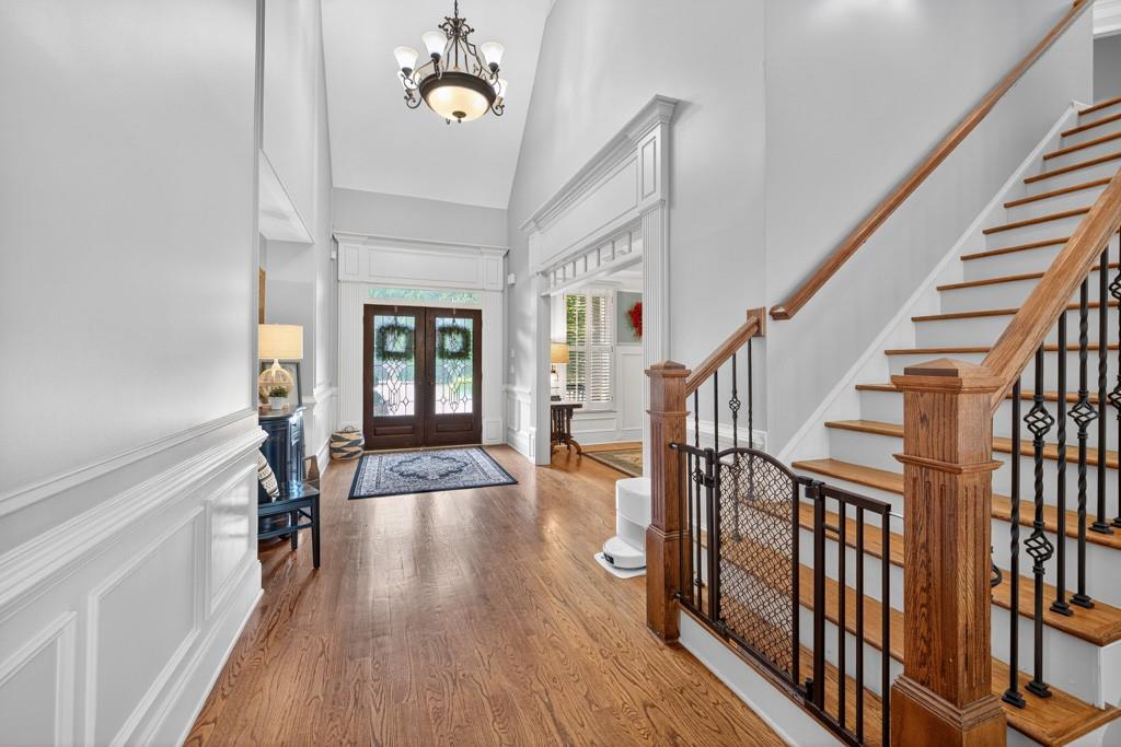 3315 Kylee Dawn Circle Lawrenceville, GA 30045 - Photo 10 of 97 a view of an entryway with wooden floor and stairs