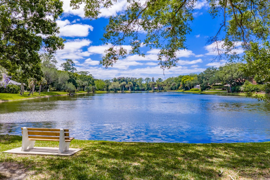 4384 2nd Square Southwest Vero Beach, FL 32968 - Photo 15 of 36 a view of a lake with houses in the back