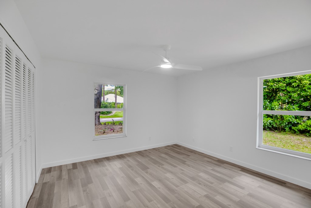4384 2nd Square Southwest Vero Beach, FL 32968 - Photo 21 of 36 an empty room with windows