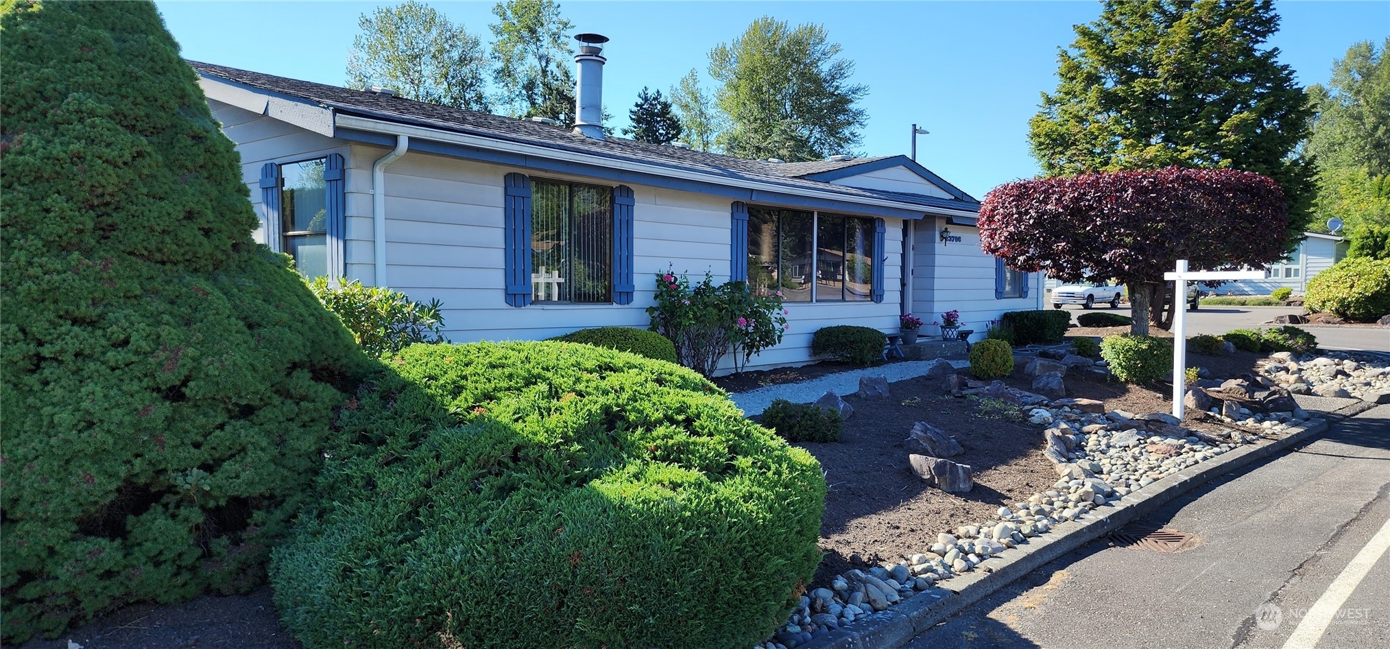 23706 Lake Drive West Bothell, WA 98021 - Photo 2 of 24 a front view of a house with garden
