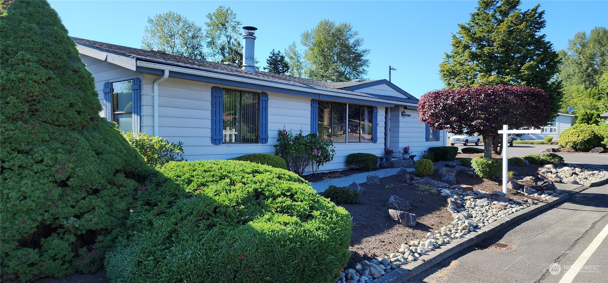 23706 Lake Drive West Bothell, WA 98021 - Photo 21 of 24 a front view of a house with garden