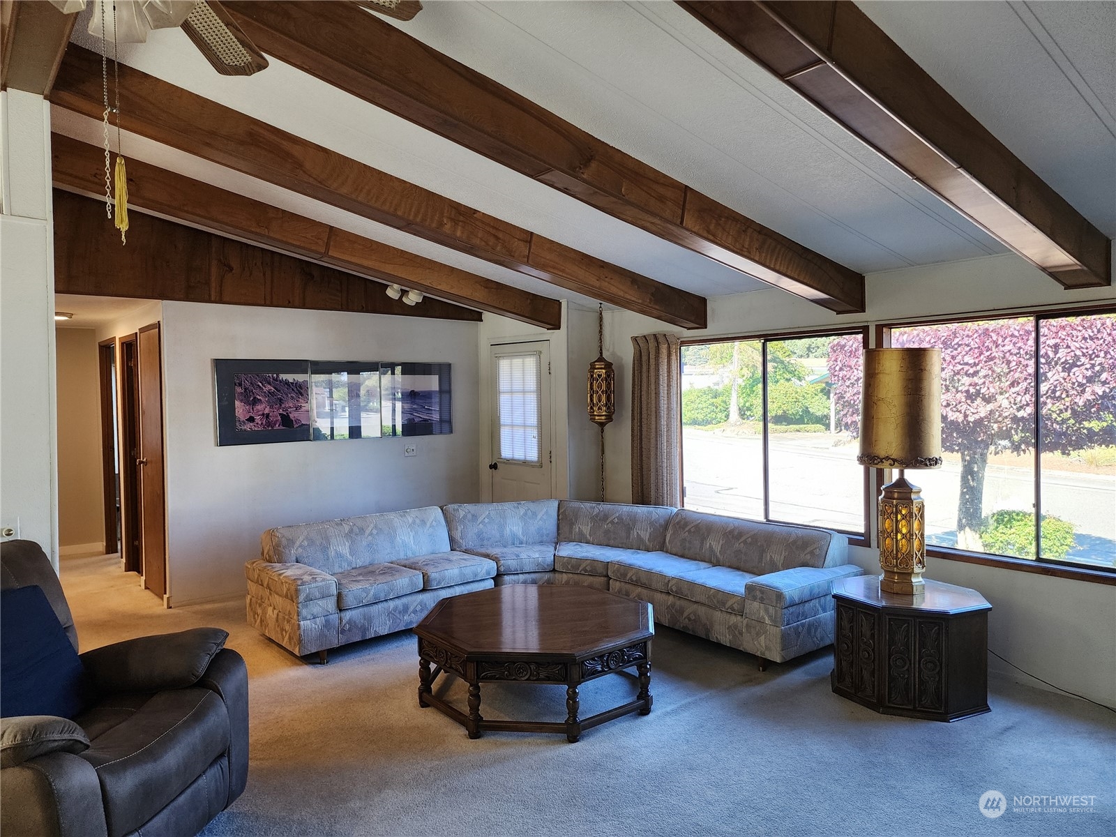 23706 Lake Drive West Bothell, WA 98021 - Photo 9 of 24 a living room with furniture and a large window