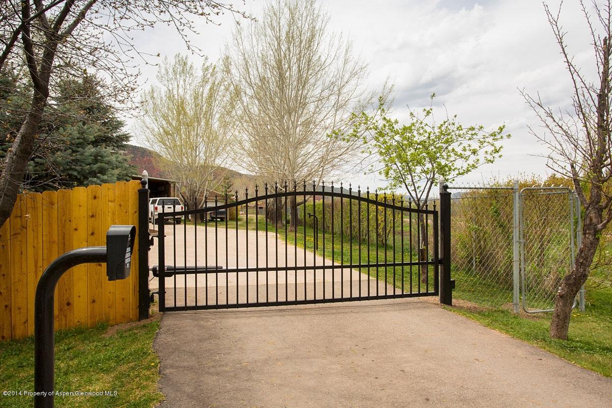 2457 Emma Road Basalt, CO 81621 - Photo 4 of 31 Property is gated and fenced.