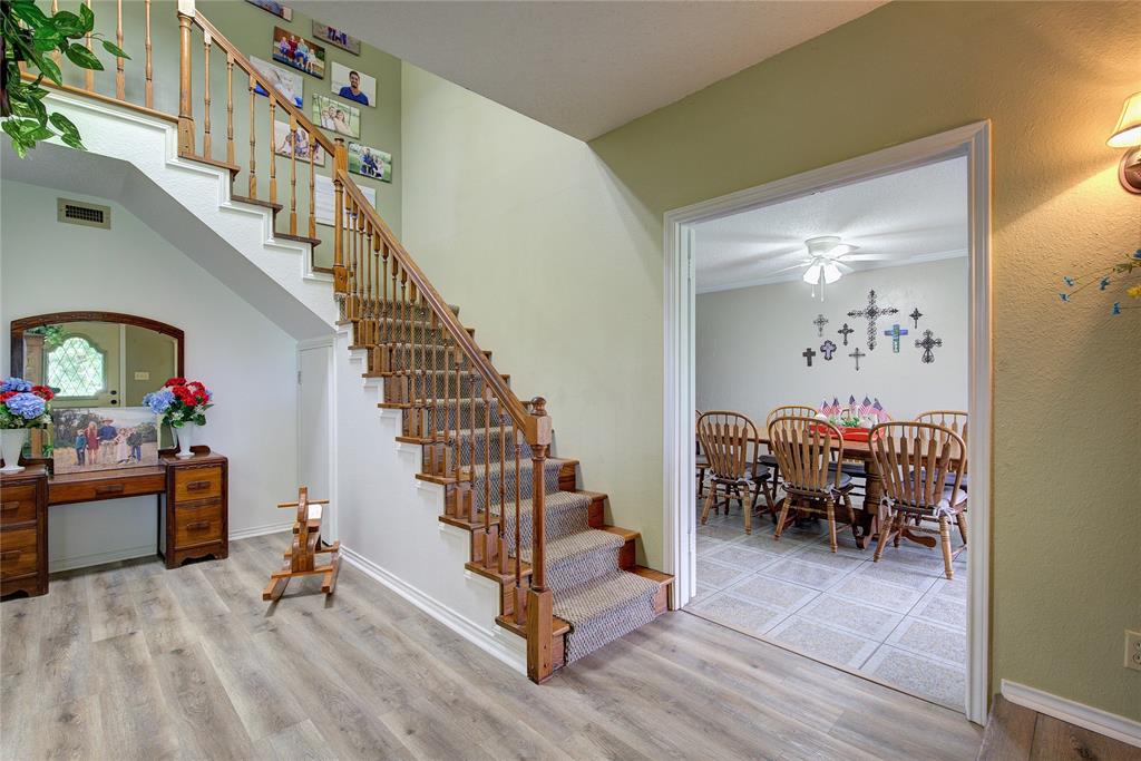 753 County Rd SW 3110 Mount Vernon, TX 75457 - Photo 6 of 40 Foyer opens to dining room on one side and living room on the other.