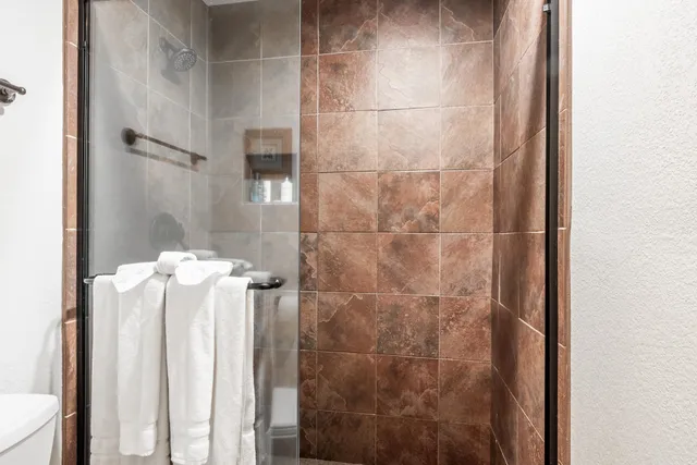 a bathroom with a mirror