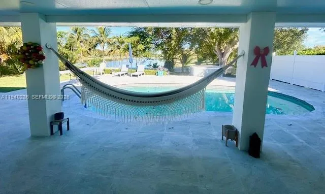 a view of a room with a large window