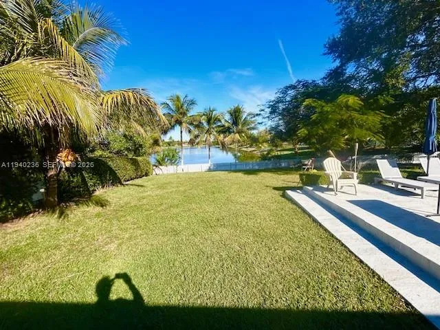 a view of a yard with an outdoor space