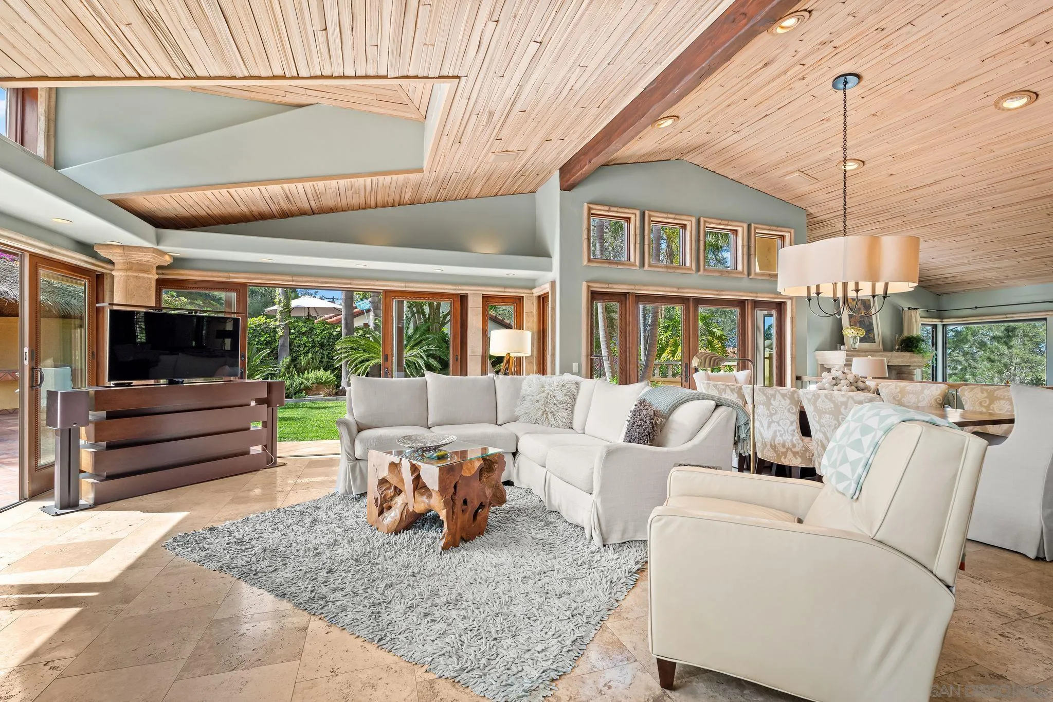 2969 Racetrack View Drive Del Mar, CA 92014 - Photo 11 of 59 a living room with furniture and a floor to ceiling window