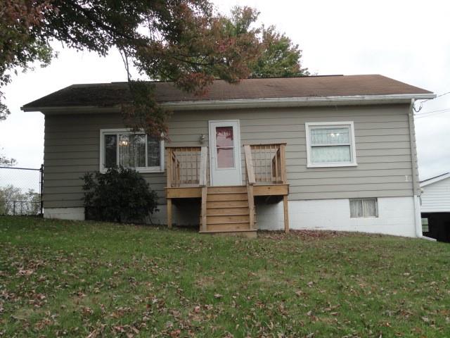 781 Herman Road Butler, PA 16002 - Photo 1 of 15 a front view of a house with garden