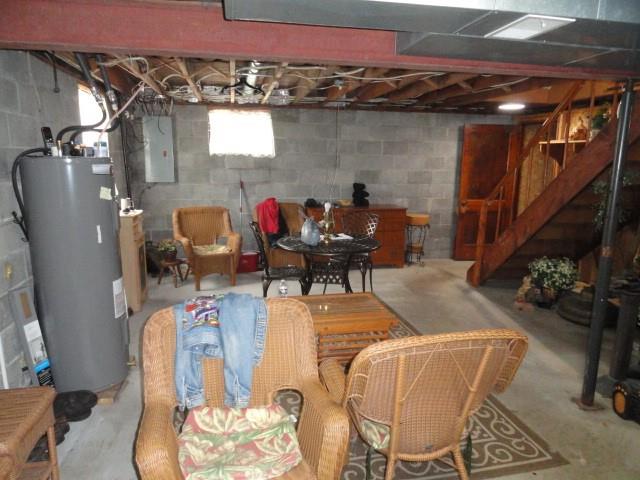 781 Herman Road Butler, PA 16002 - Photo 15 of 15 a living room with furniture and a chandelier