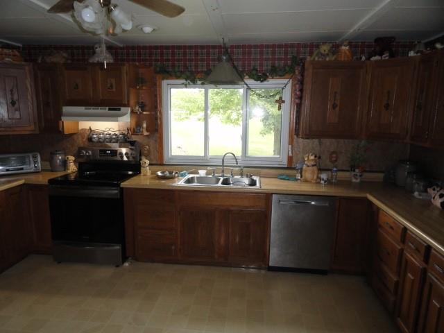 781 Herman Road Butler, PA 16002 - Photo 6 of 15 a kitchen with a sink a window and cabinets