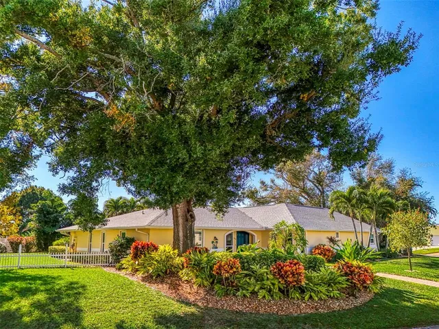 front view of a house with a garden