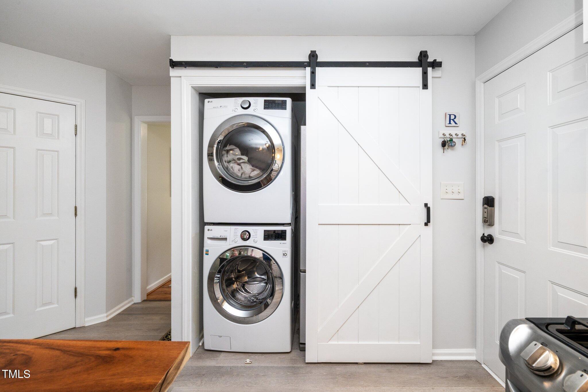 8009 Tobin Place Raleigh, NC 27612 - Photo 15 of 29 a utility room with dryer and washer