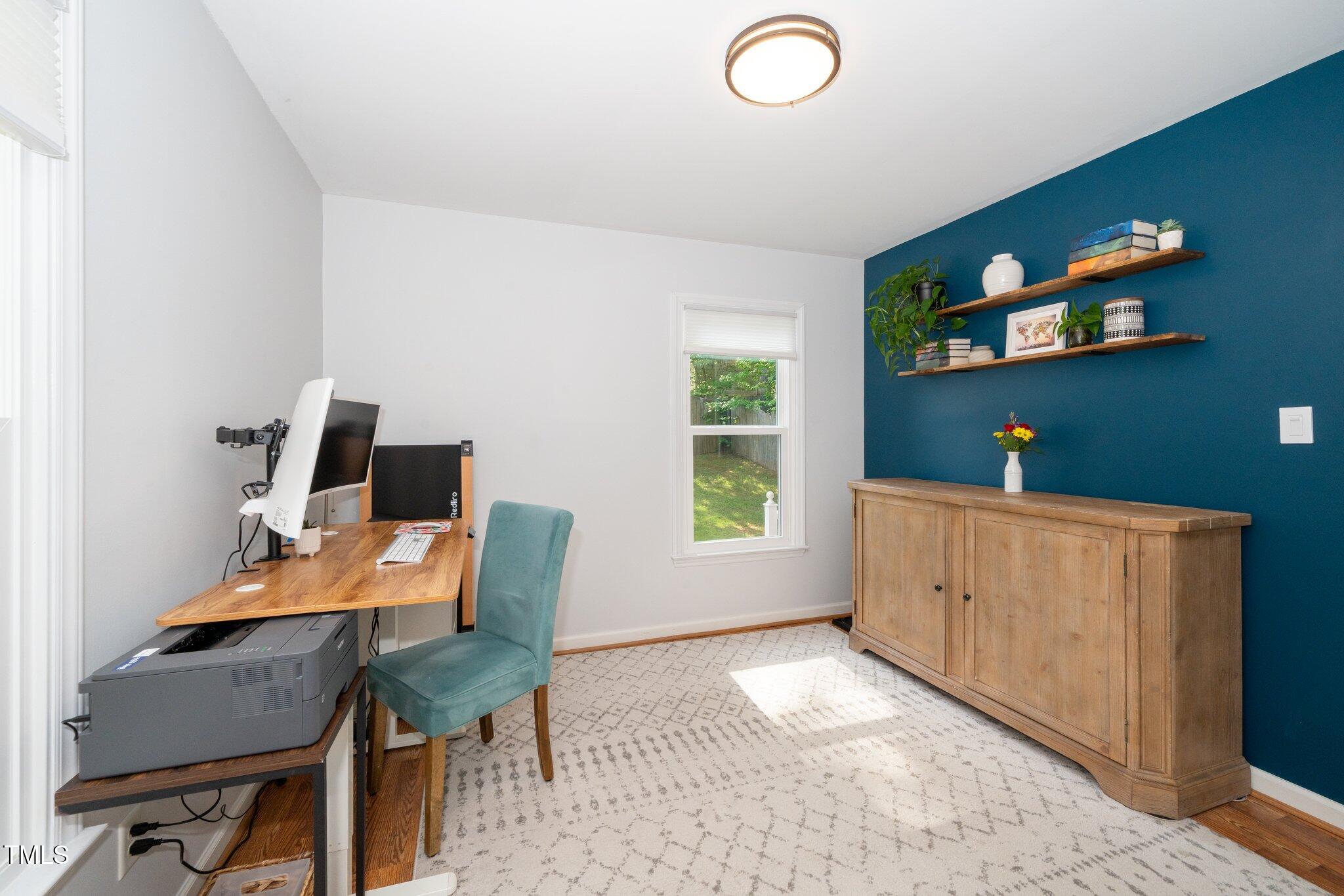8009 Tobin Place Raleigh, NC 27612 - Photo 16 of 29 a workspace with furniture and window