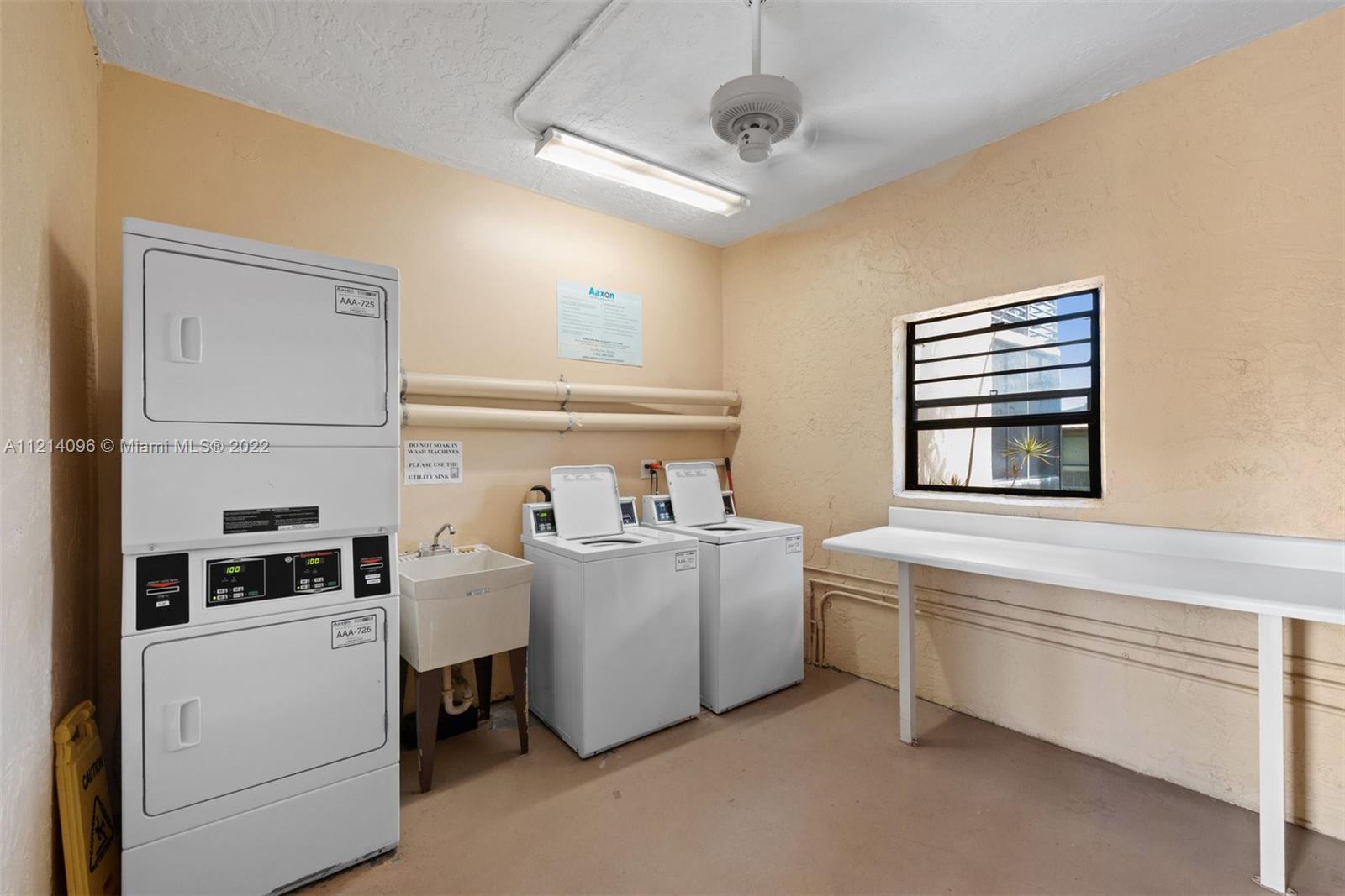 275 Gate Road, Unit 119 Hollywood, FL 33024 - Photo 20 of 32 a room with storage and utility