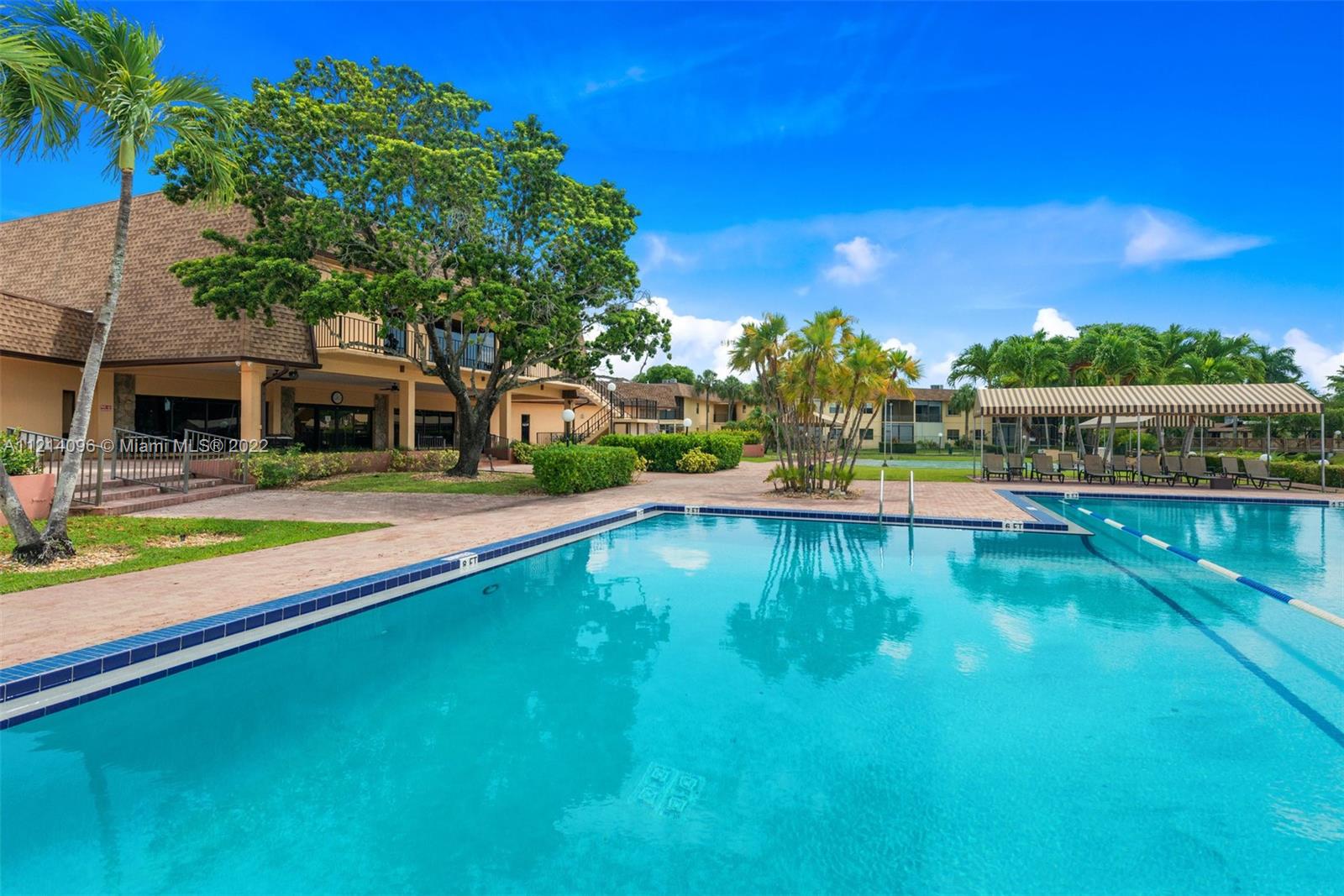 275 Gate Road, Unit 119 Hollywood, FL 33024 - Photo 29 of 32 swimming pool with outdoor seating and yard