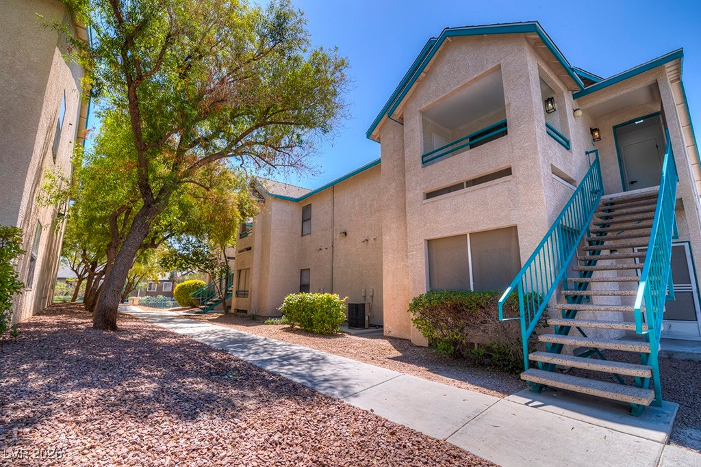 5121 South Lindell Road, Unit 206 Las Vegas, NV 89118 - Photo 27 of 34 View of building exterior with stairs