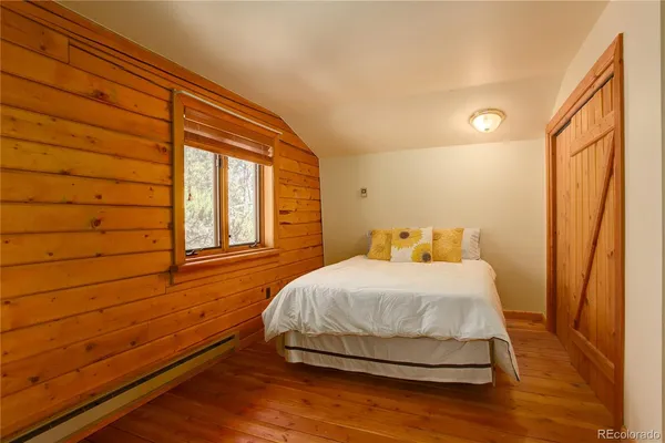 workspace with wooden floor and closet