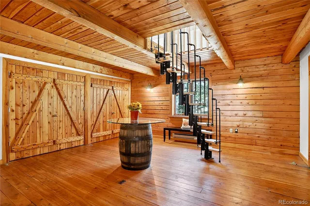 a view of entryway with wooden floor