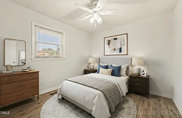 a view of a room that has a table and chairs in it