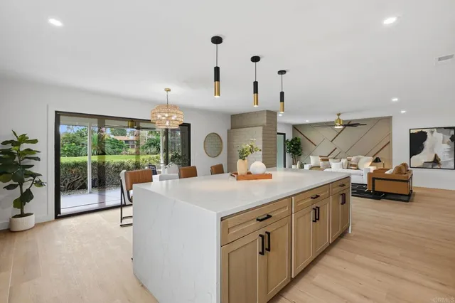 a bathroom with a sink vanity and a mirror