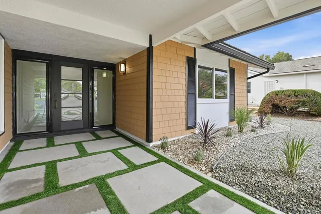 a view of entrance gate of a house