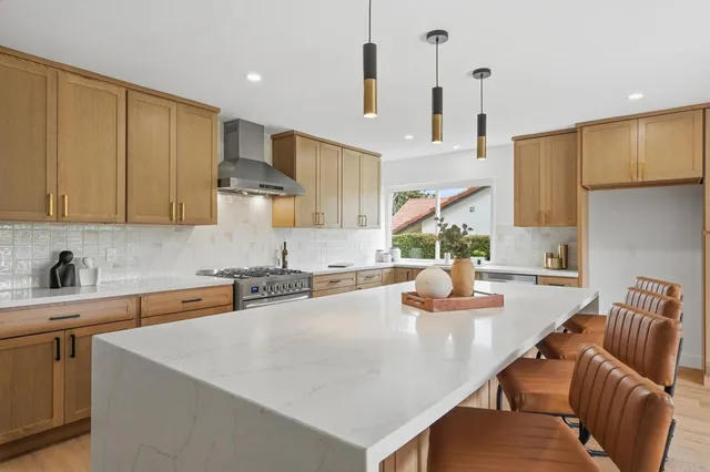 a bedroom with a bed and a ceiling fan