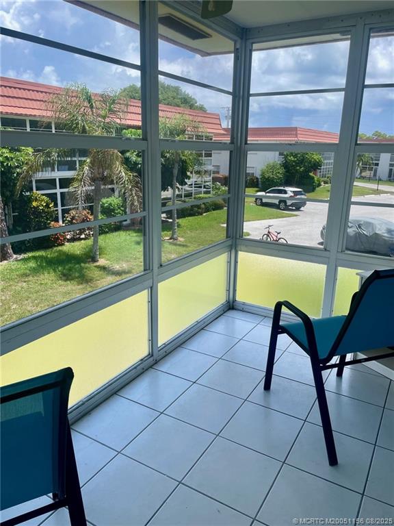 2600 Southeast Ocean Boulevard, Unit A12 Stuart, FL 34996 - Photo 11 of 17 a view of a swimming pool with a back yard