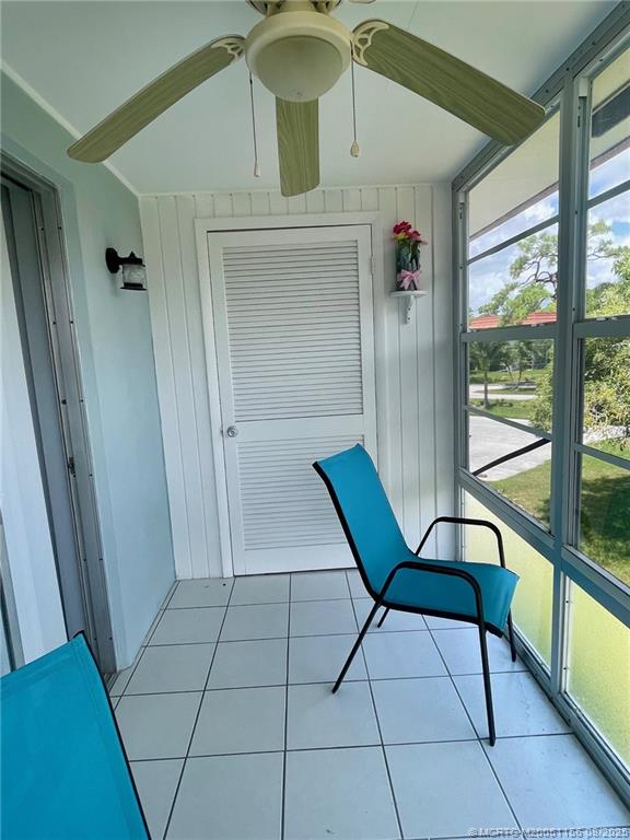 2600 Southeast Ocean Boulevard, Unit A12 Stuart, FL 34996 - Photo 14 of 17 a view of a hallway with furniture and front door