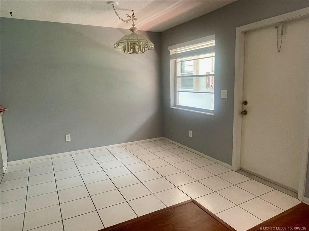 2600 Southeast Ocean Boulevard, Unit A12 Stuart, FL 34996 - Photo 5 of 17 a view of an empty room and window