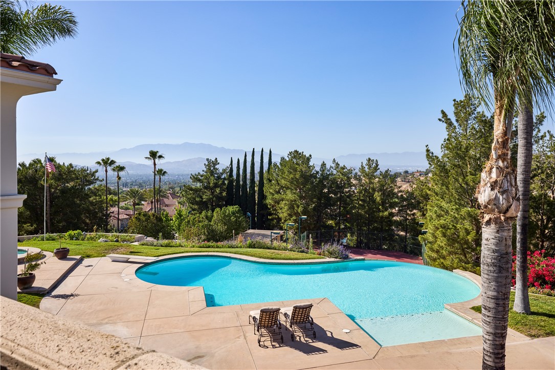 2019 Polo Court Riverside, CA 92506 - Photo 18 of 26 The second level bedrooms to the north share an expansive patio with views of the local hills and mountains on the horizon.