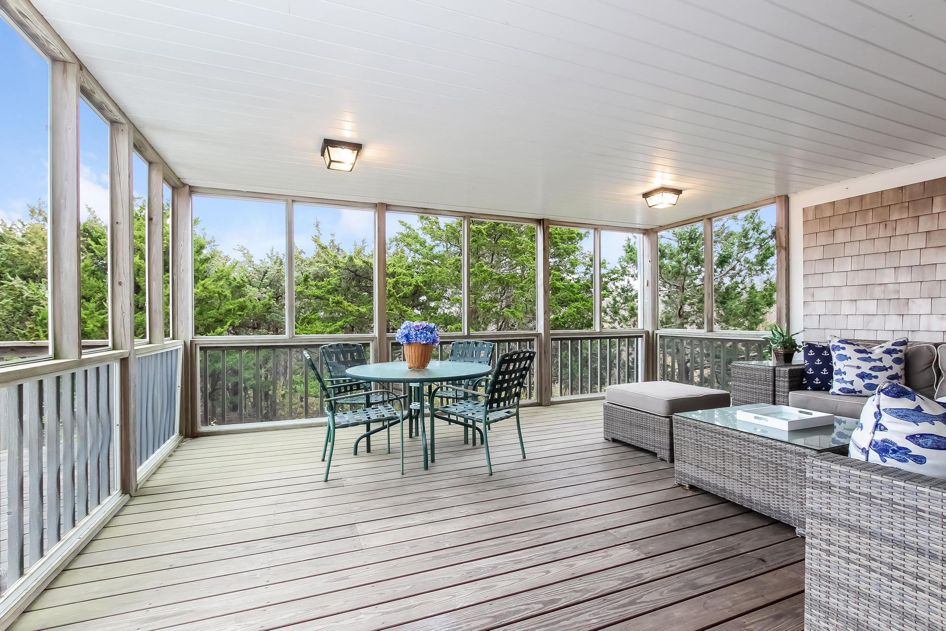 12 Governor Prence Road Brewster, MA 02631 - Photo 13 of 32 a view of a patio with wooden floor