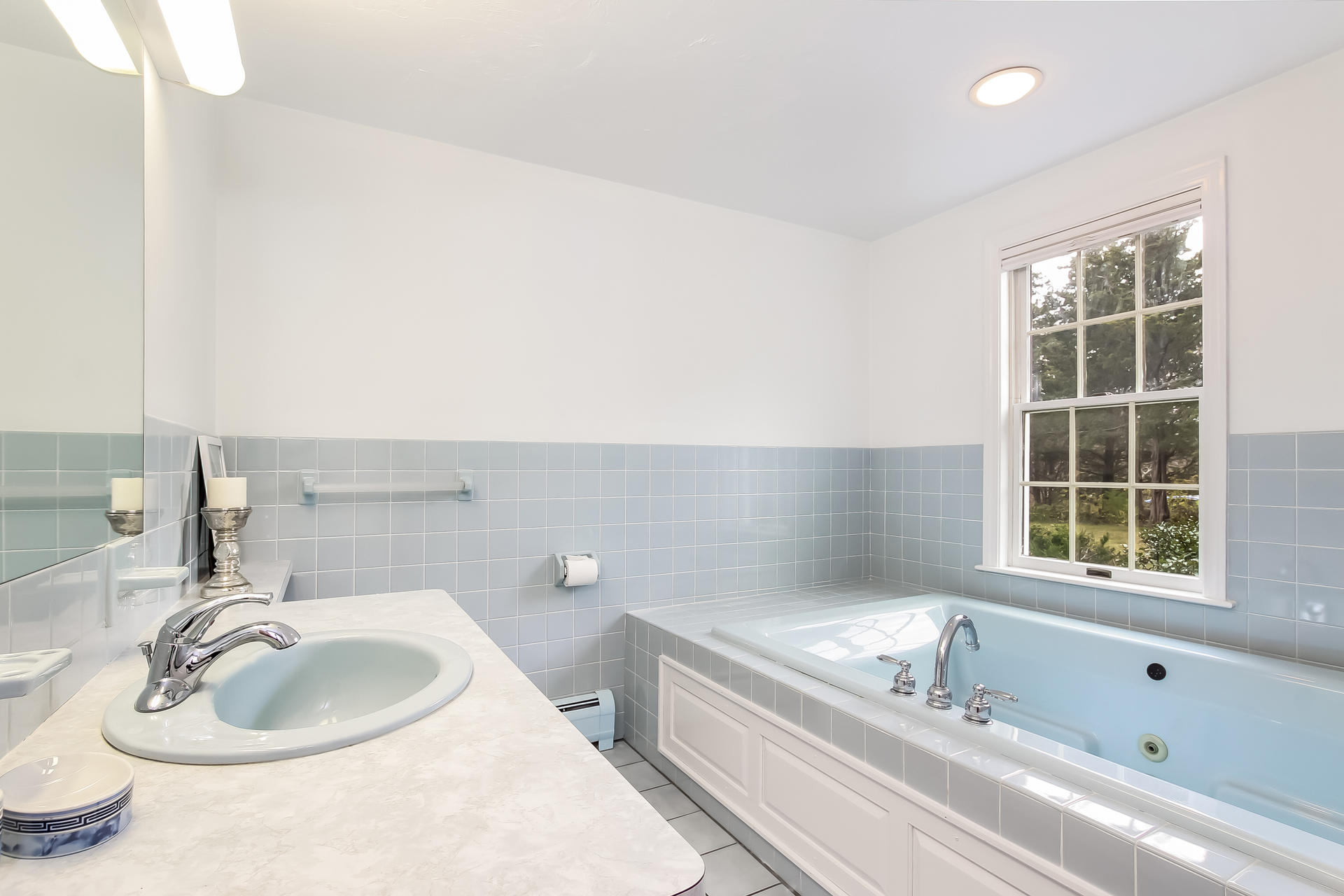 12 Governor Prence Road Brewster, MA 02631 - Photo 17 of 32 a bathroom with a sink and a bathtub