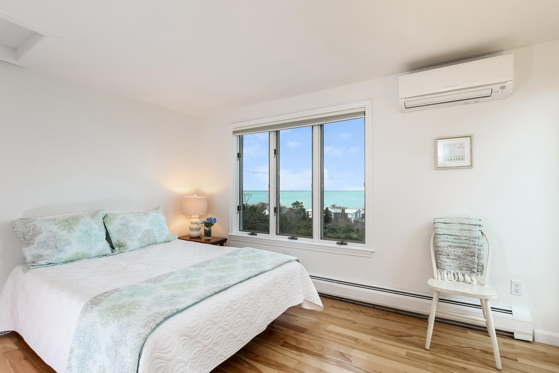 12 Governor Prence Road Brewster, MA 02631 - Photo 22 of 32 a bedroom with a large bed and a window