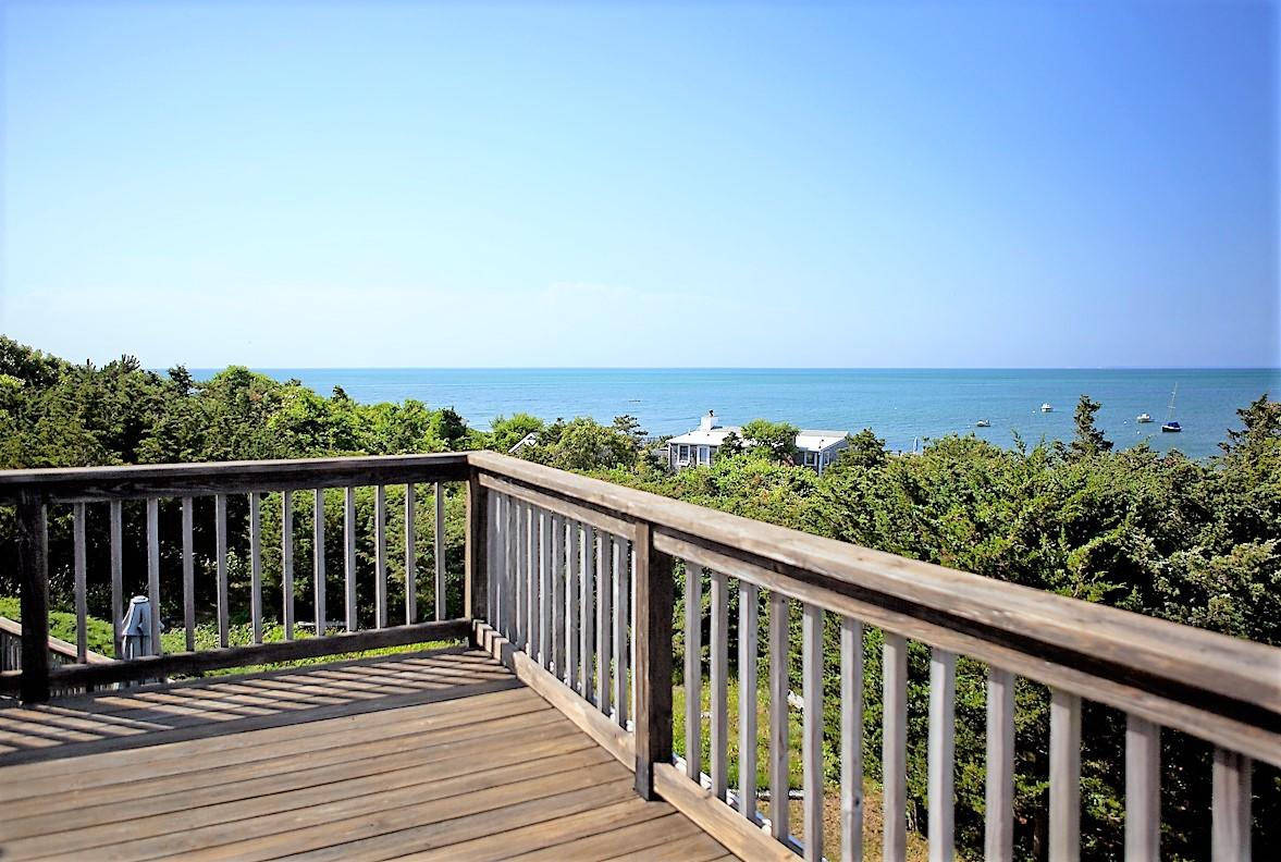 12 Governor Prence Road Brewster, MA 02631 - Photo 23 of 32 a balcony with wooden floor and fence