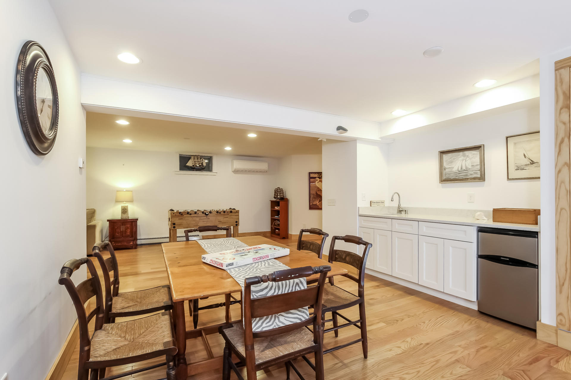 12 Governor Prence Road Brewster, MA 02631 - Photo 26 of 32 a view of a dining room with furniture and a kitchen
