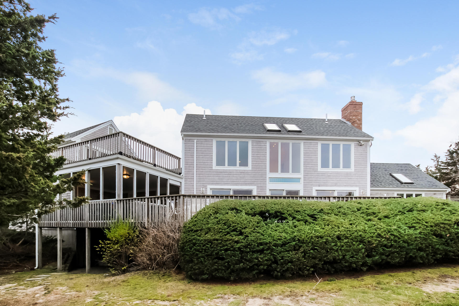 12 Governor Prence Road Brewster, MA 02631 - Photo 32 of 32 a front view of a house with a yard