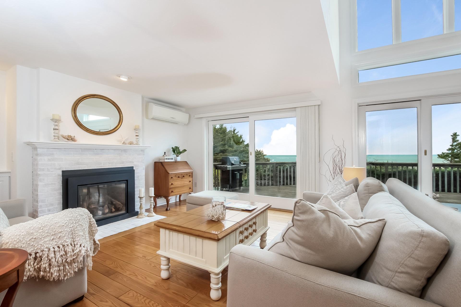 12 Governor Prence Road Brewster, MA 02631 - Photo 5 of 32 a living room with furniture and a fireplace