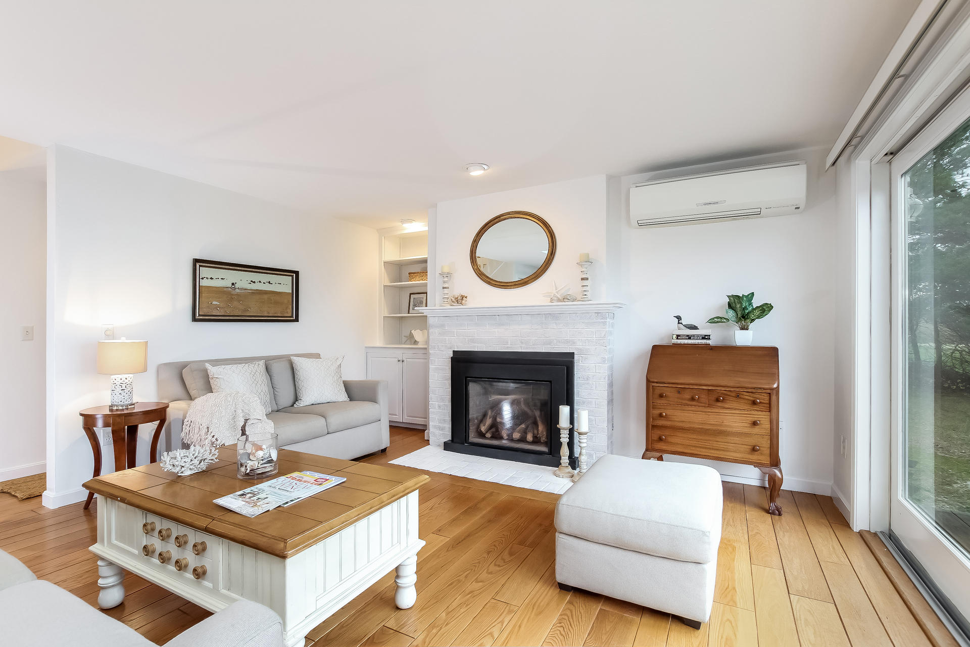 12 Governor Prence Road Brewster, MA 02631 - Photo 7 of 32 a living room with furniture and a fireplace