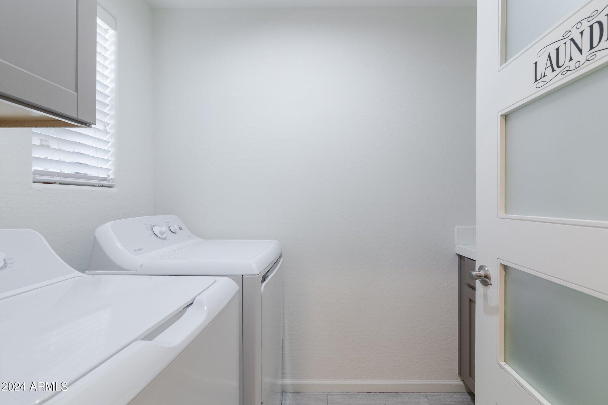 3935 East Rough Rider Road, Unit 1253 Phoenix, AZ 85050 - Photo 15 of 22 Rough Rider Laundry Room