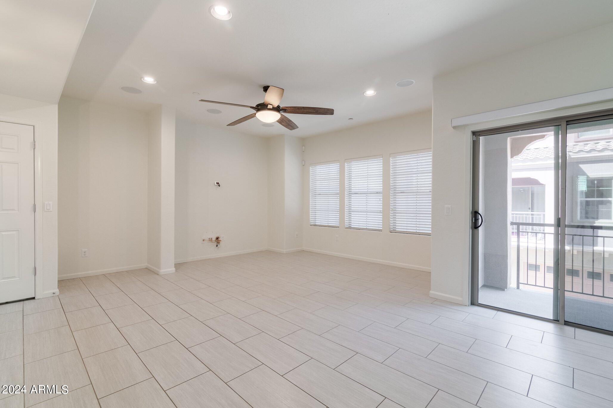 3935 East Rough Rider Road, Unit 1253 Phoenix, AZ 85050 - Photo 6 of 22 Rough Rider Living Room 2