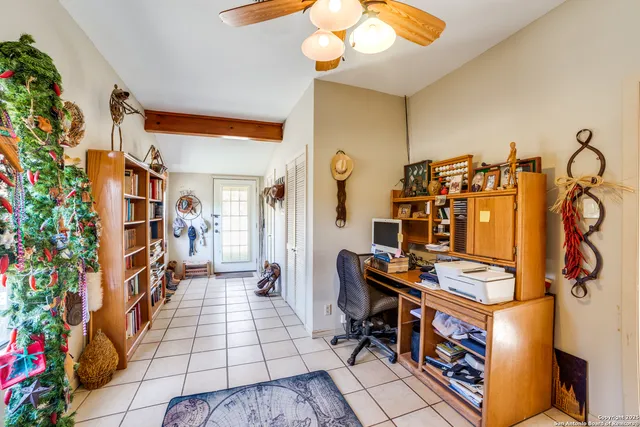 a bathroom with a sink mirror vanity and toilet