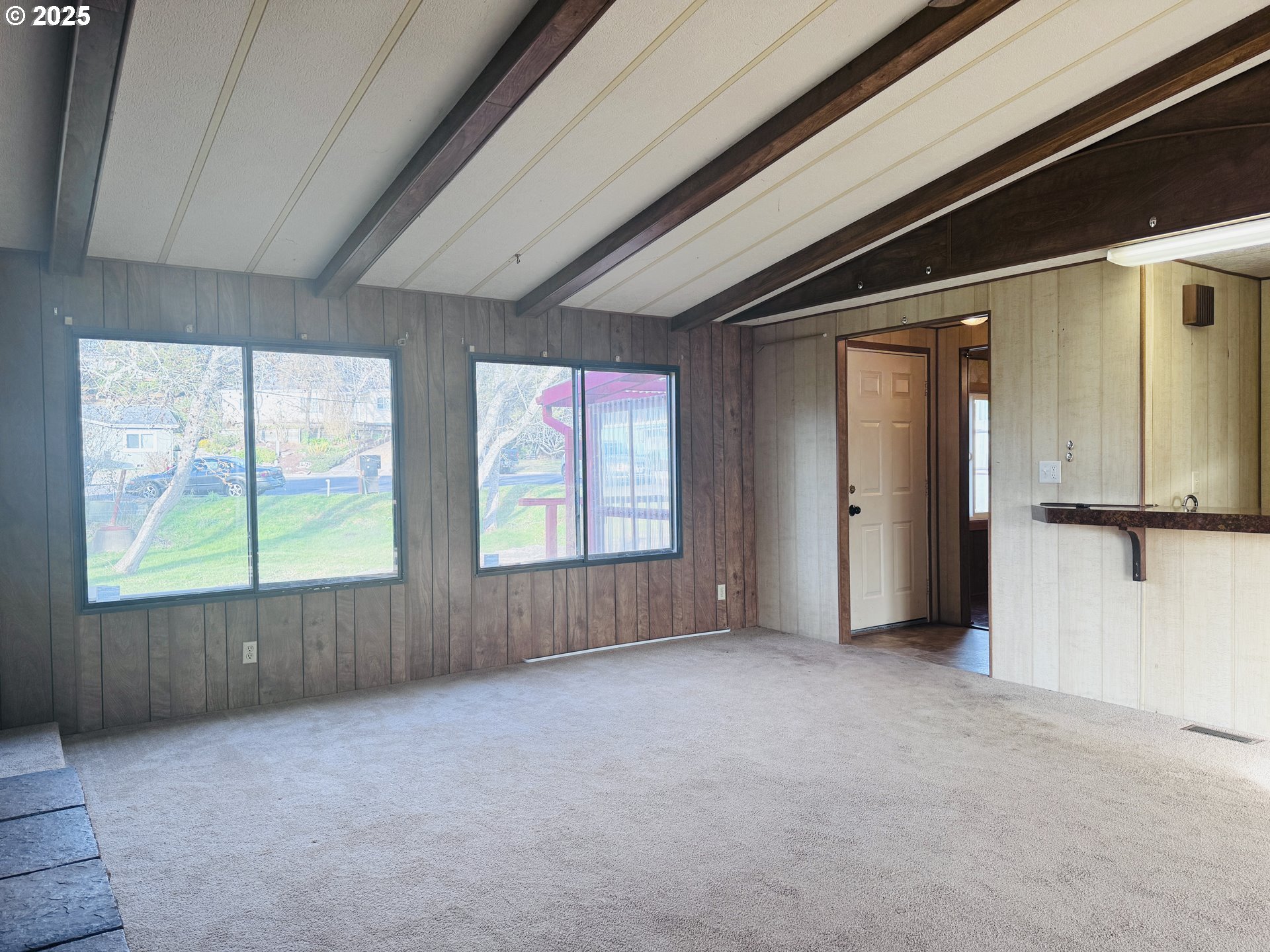 380 Leelo Court Florence, OR 97439 - Photo 7 of 37 an empty room with windows