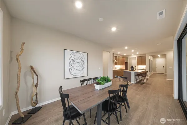 a view of a dining room with furniture