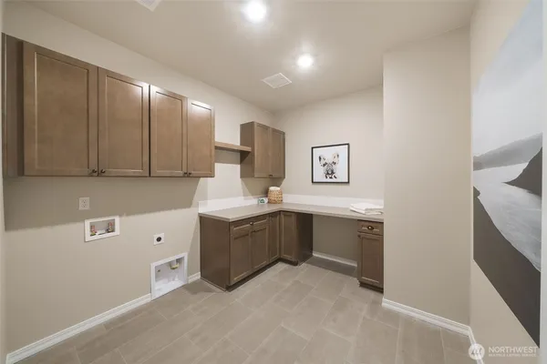 a spacious bedroom with a bed and window