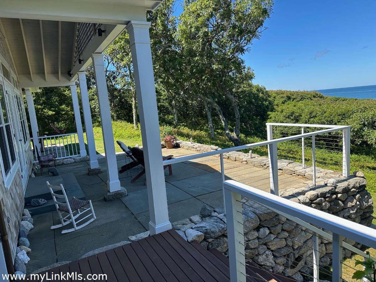 78 Hammett Road Chilmark, MA 02535 - Photo 20 of 53 Large Blue Stone Patio Outside Living Room