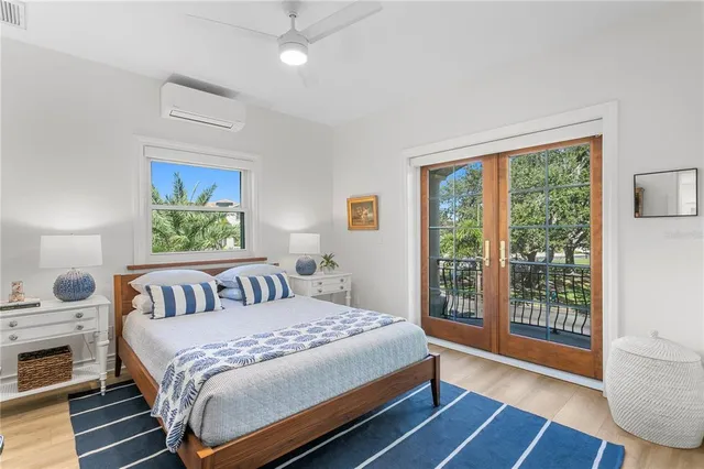 a bathroom with a double vanity sink toilet and shower