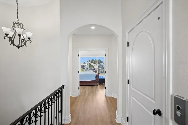 a view of a room with a large window and dining room