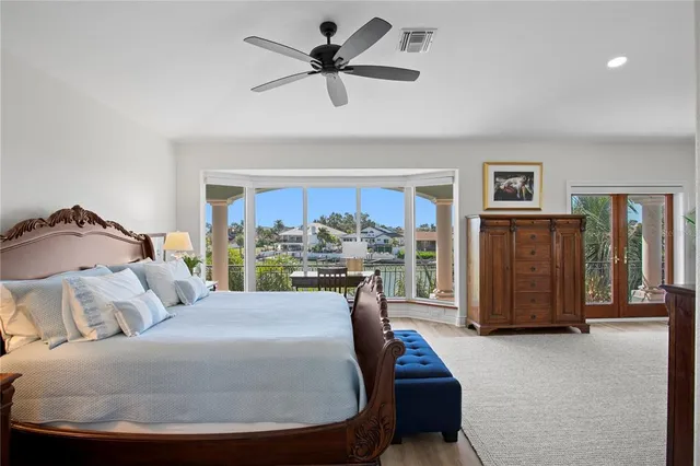 a bathroom with a sink double vanity and a mirror
