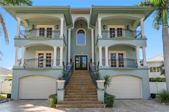 a view of a house with fountain bath tub and chairs